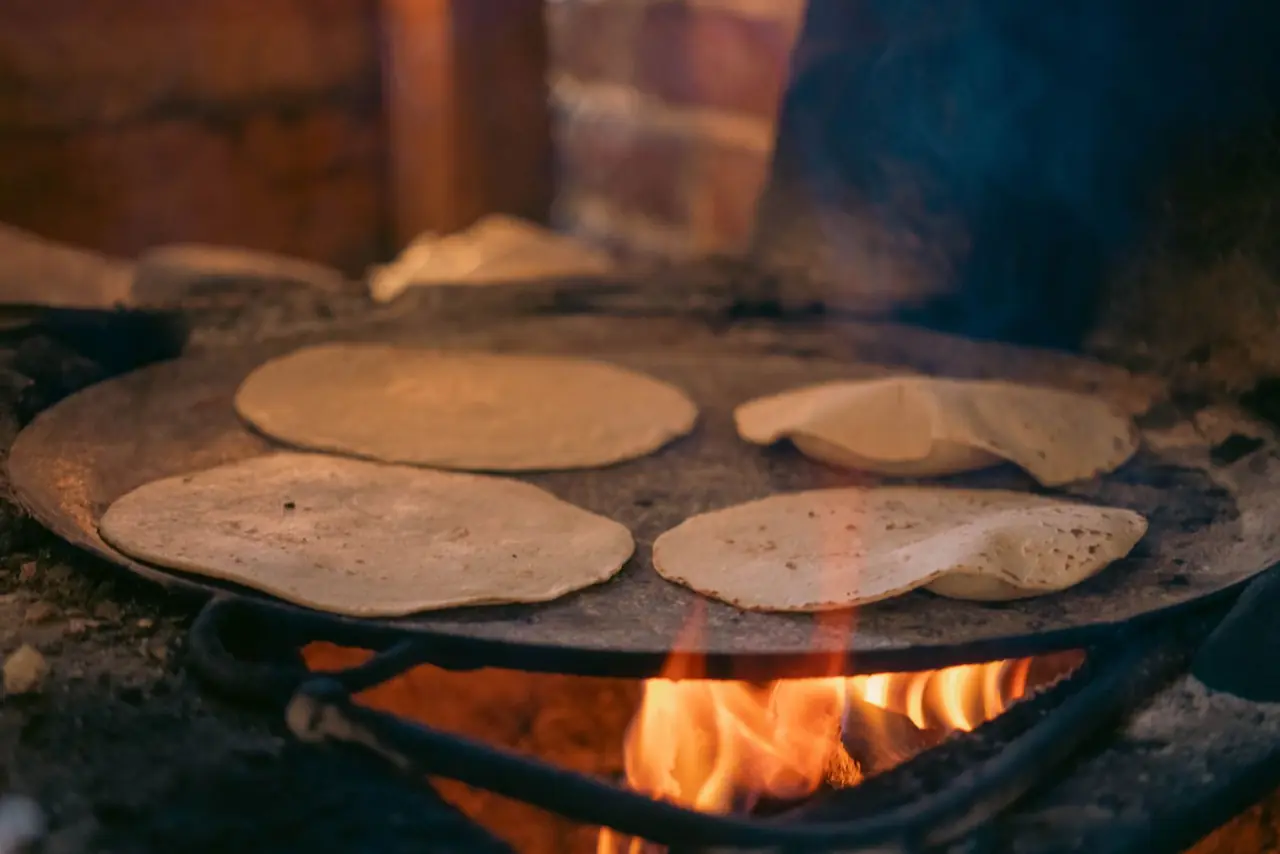 Fresh tortillas on a hot comal